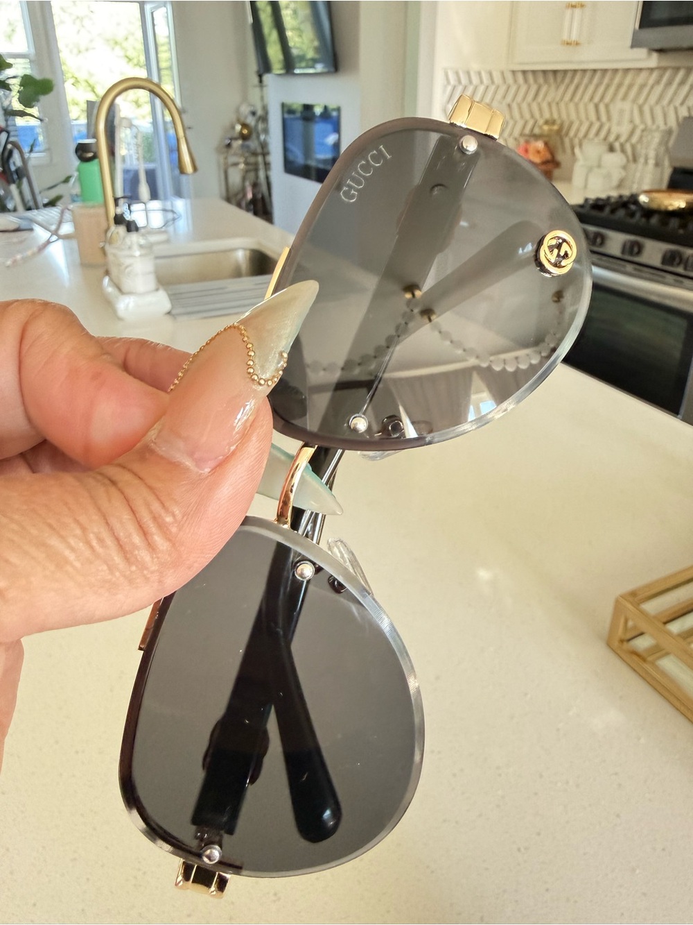 Gucci Aviator Sunglasses in Gray and Gold